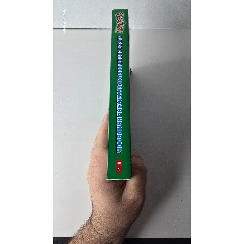 Pokémon super Extra Deluxe Essential Handbook isbn 9781338714128 scholastic fact